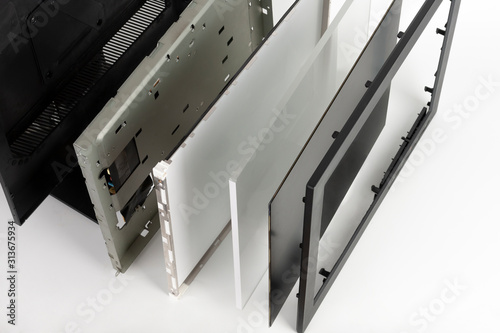 Several parts of LCD monitor, plastic frame, panel consists of polarizing filters, glass and  liquid-crystal display, organic glass,