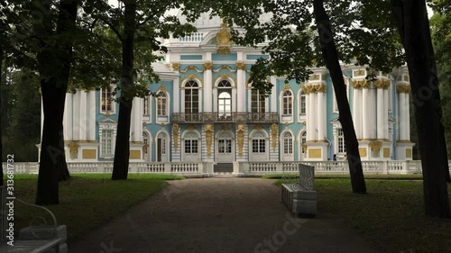 Handheld shot of path to Hermitage pavilion in Tsarskoe Selo during summer time. Alley to Hermitage, Catherine's Park in Tsarskoye Selo. A park pavilion built in the Baroque style photo