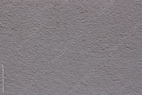 Smooth violet plaster wall texture for background