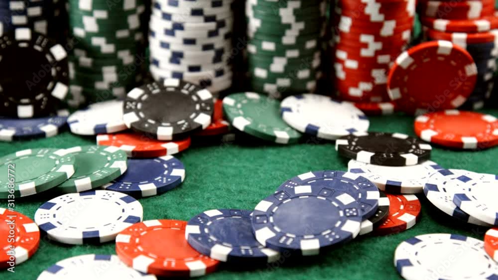 Casino Chips Fall on Felt in Slow Motion Casino Chips Fall on Felt in Slow Motion