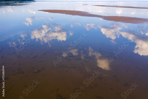 Reflection of clouds in the water surface of the Gulf of Finland