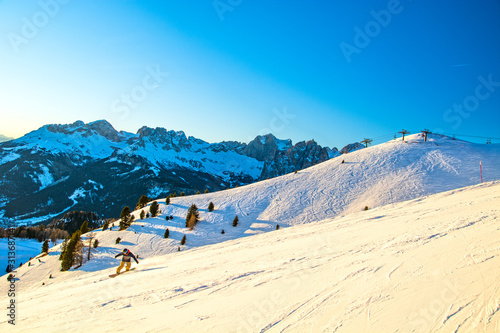 Dolomites ski slope in winter, Vigo di Fassa area