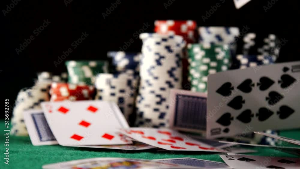 Cards Fall with Casino Chips in Slow Motion Cards Fall with Casino Chips in Slow Motion