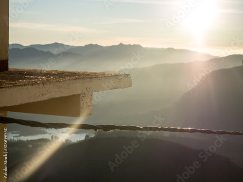 A suntrise morning view over the sri lankan high country from the summit of adams peak sri pada photo