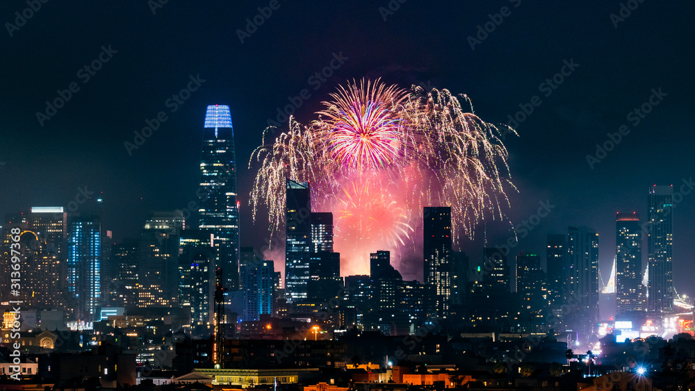 San Francisco downtown skyline visible against the New Year's Day Fireworks Show;