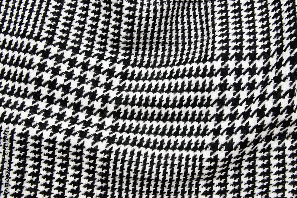 Black and white cage fabric or cloth textile.