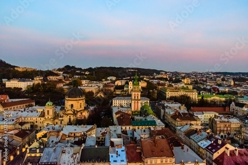 View on Dominican cathedral, Dormition church and historic center of the Lviv at sunset. View on Lvov cityscape from the town hall