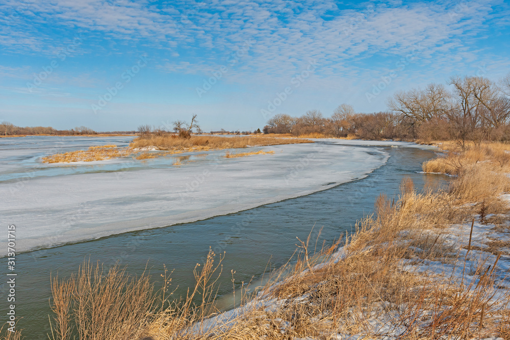 Partially Frozen River in Late Winter