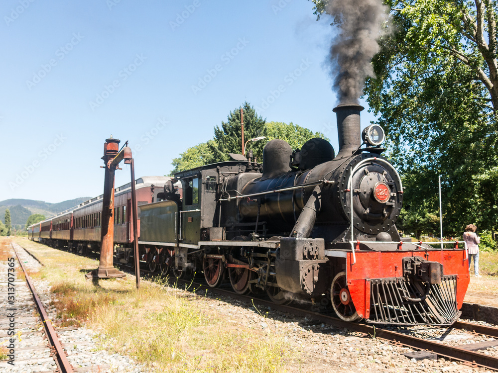 Tourist train called Valdiviano that runs from Valdivia to Antilhue with a 1913 North British locomotive type 57. Los Rios Region, in southern Chile. Tourist train called Valdiviano that runs from Valdivia to Antilhue with a 1913 North British locomotive type 57. Los Rios Region, in southern Chile.