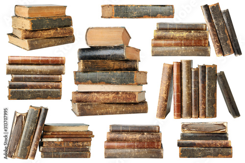 Isolated old books. Collection of old books in piles and stacks isolated on white background with clipping path
