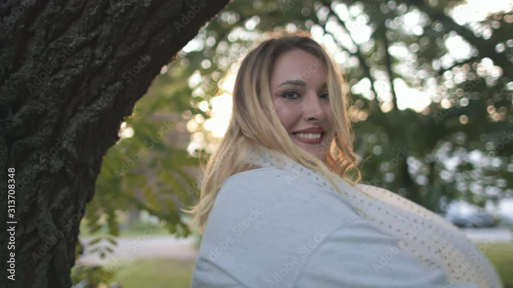 Pretty Woman Plus Size Wave Chiffon Scarf Outdoors. Blonde Caucasian Fashion Model Girl Smile Park Scenery Background. Joyful Lady Enjoy Casual Clothes Happy Moments Summertime Slow Motion 4K Pretty Woman Plus Size Wave Chiffon Scarf Outdoors. Blonde Caucasian Fashion Model Girl Smile Park Scenery Background. Joyful Lady Enjoy Casual Clothes Happy Moments Summertime Slow Motion 4K
