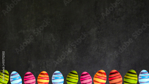 Happy Easter background - Frame made of colorful painted eggs isolated on dark black stone concrete texture, top view with space for text