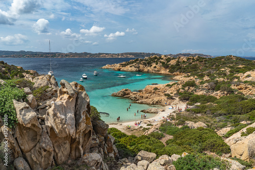 The view on beautiful Cala Napoletana. Beaches of Caprera Island in The Maddalena Archipelago. Transparent turquoise water in Sardinia, Italy