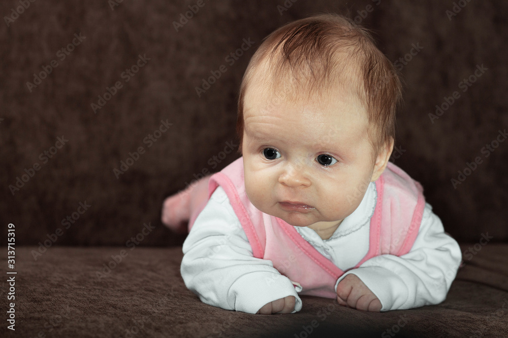 little two month old girl lying