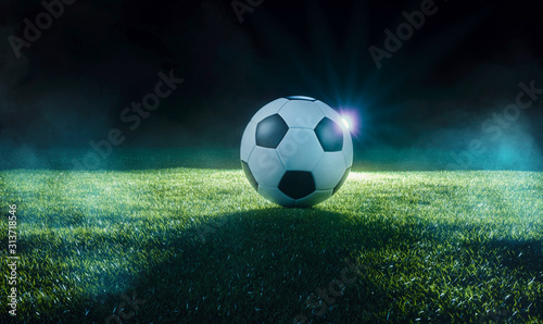 Football on an illuminated sports field at night © Martin Piechotta
