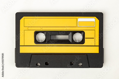 Black Audio Tape with yellow Label