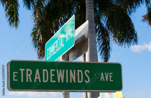 Street signs for Commercial Blvd and Tradewinds Avenue