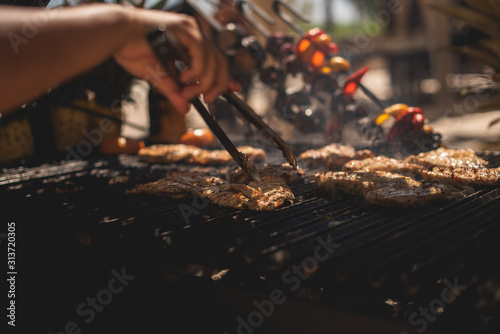 Los Cabos, Baja California, Mexico - Oct 2019 Barbecue is a cooking method, techniques include smoking, roasting or baking, braising and grilling