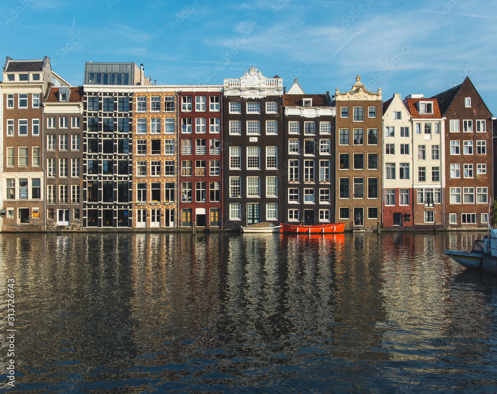 Beautiful Amsterdam Residential Buildings with River and Water Reflection 