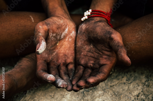 Cuadro en lienzo old man beggar begging you for help sitting at dirty slum