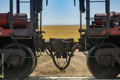 Fotografija Close up of train coupler connecting two wagons of a Canadian freight or cargo train