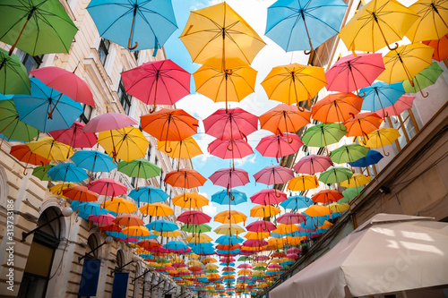 Colorful umbrellas street Strada Alba Iulia in Timisoara, Romania photo