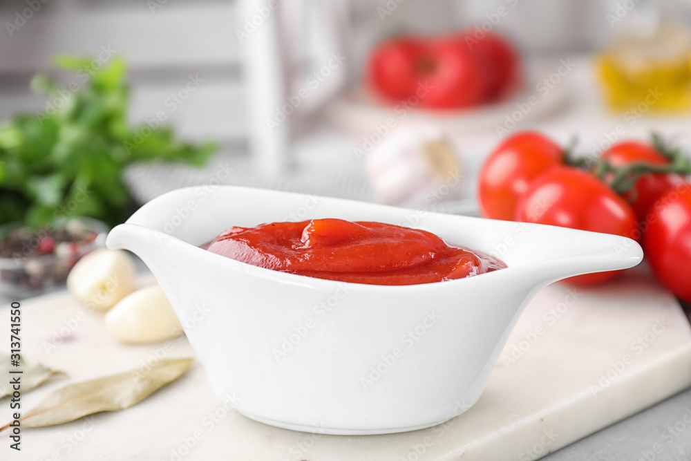 Delicious tomato sauce on light table, closeup Delicious tomato sauce on light table, closeup