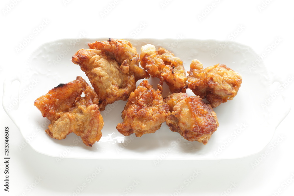 Homemade fried chicken on white dish