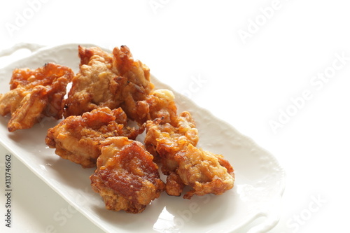 Homemade fried chicken on white dish