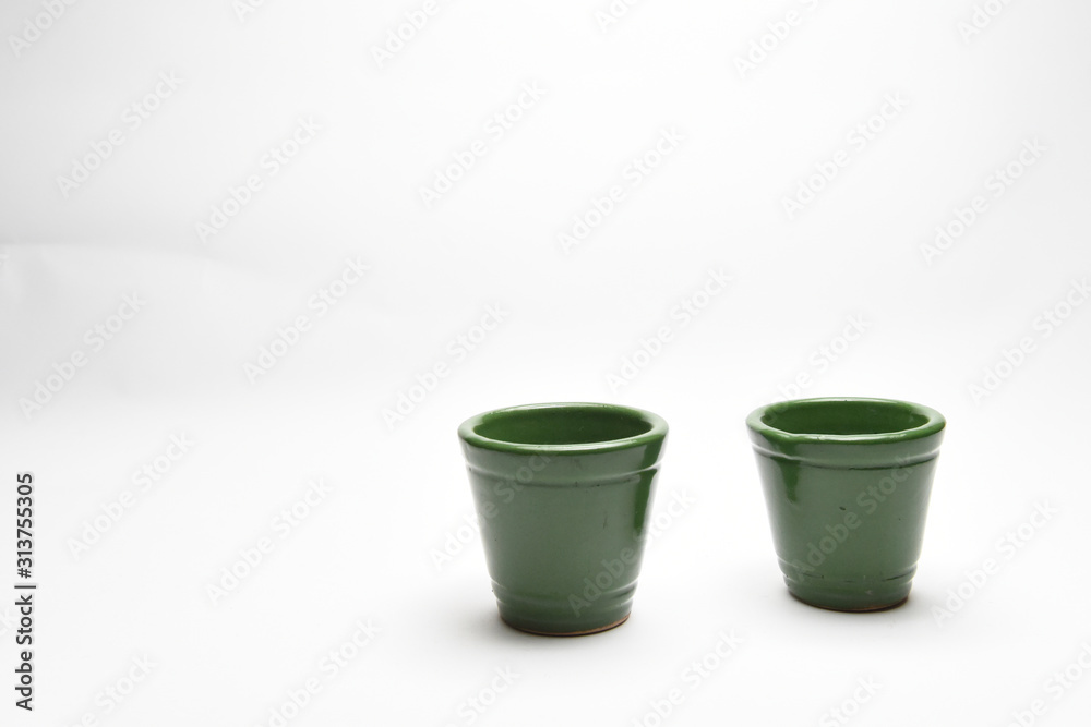 green coffee cup isolated over white background