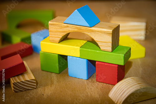 Colorful wooden block for kids. Toddler toys. Building learning concept