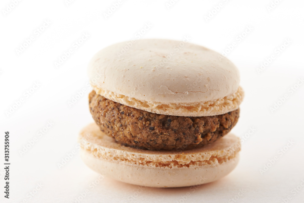 Chocolate macaroon on white background Chocolate macaroon on white background