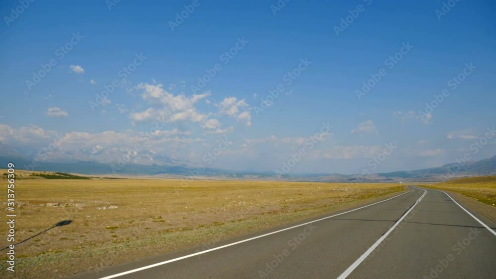 camera flies over the road through the mountains and the steppe camera flies over the road through the mountains and the steppe