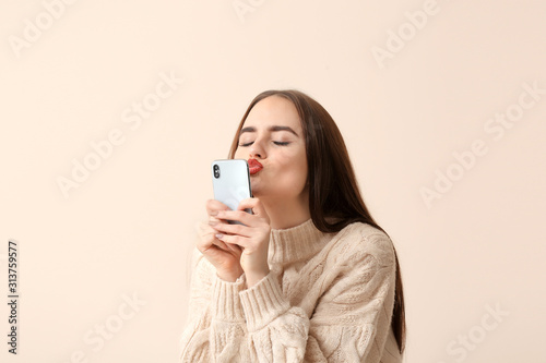 Beautiful young woman with ...