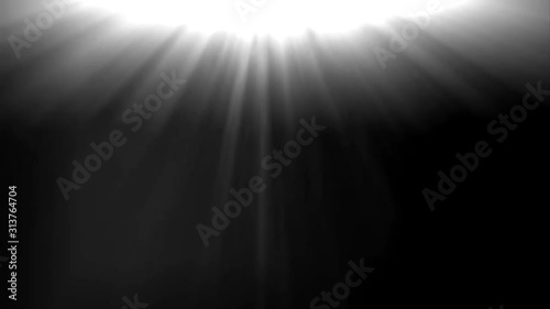The white light that was pouring down in the middle of the video.