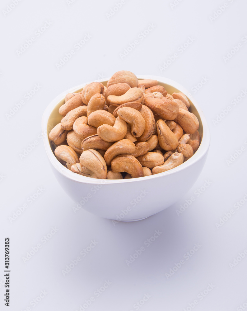 nuts or cashew nuts on the background new. nuts or cashew nuts on the background new.