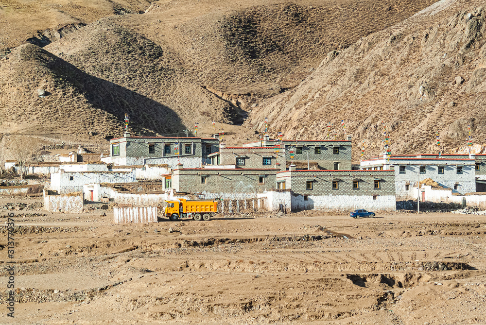 Traditional Tibetan village houses near  the mountain in Tibet