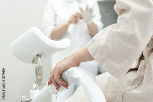 Patient with a gynecologist in the gynecological office