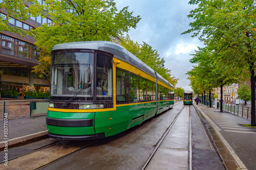 Helsinki. Finland. Tram on the city streets. Modern tram on the street of Helsinki. Public transport in Finland. Suomi. Tourism in Finland. Traveling in the European Union. Low floor trams.