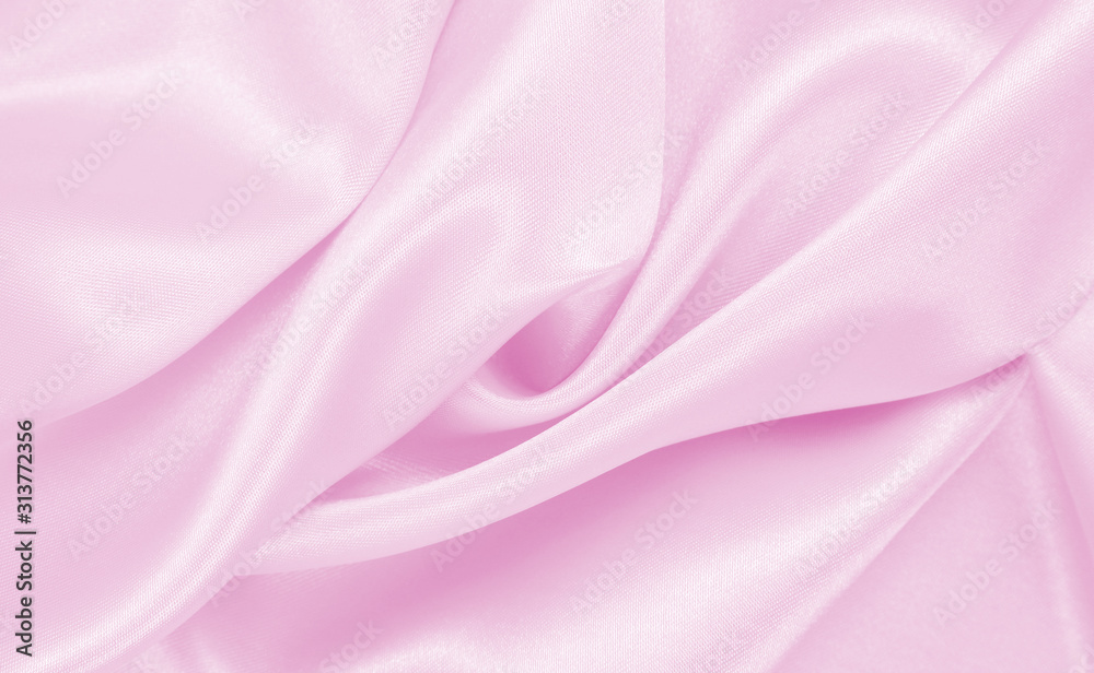 Fototapeta premium Smooth elegant pink silk or satin texture as wedding background. Luxurious background design
