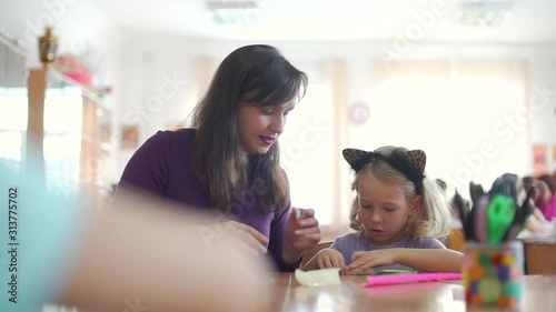 Wallpaper Mural Little Girl with Mother Engaged in Handcrafts. Creating Artificial Tulip Flowers with their Own Hands. Art, Handmade Crafts and Mothers Day Concept Torontodigital.ca