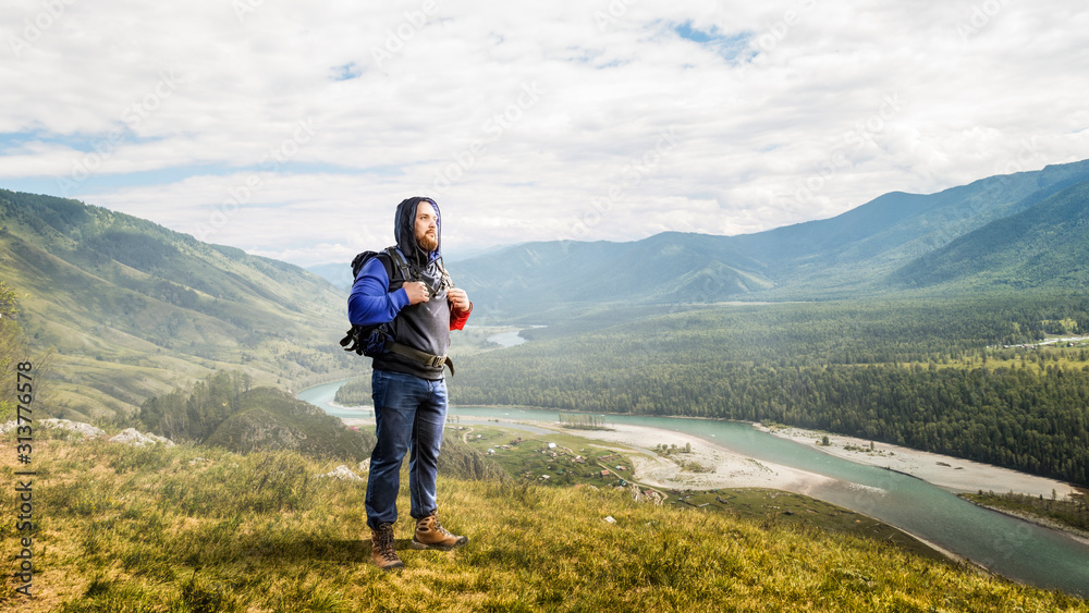 Hiker man in mountains. Mixed media
