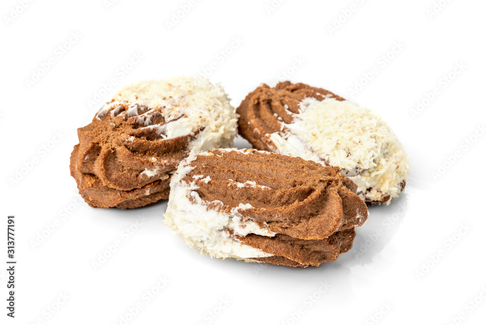 Chocolate shortbread cookies with coconut isolated on white background.