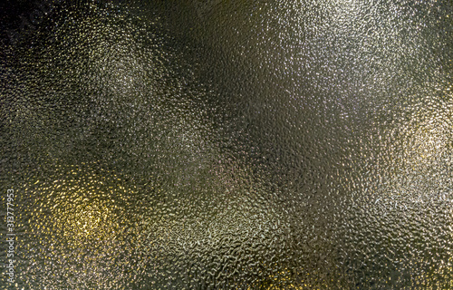 Closeup of frosted glass texture background