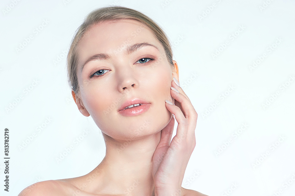 face of beautiful woman pointing at her eye area. perfect skin face of beautiful woman pointing at her eye area. perfect skin