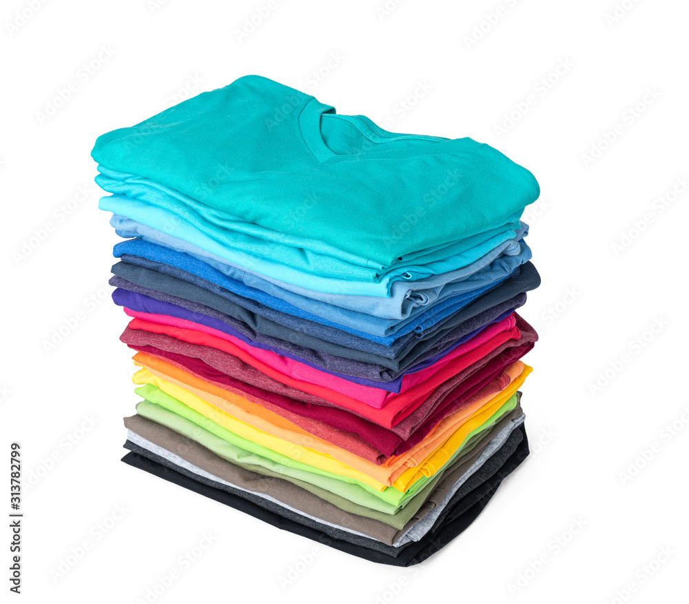 Stack of colorful t-shirt isolated on white background. File contains a path to isolation. Stack of colorful t-shirt isolated on white background. File contains a path to isolation.