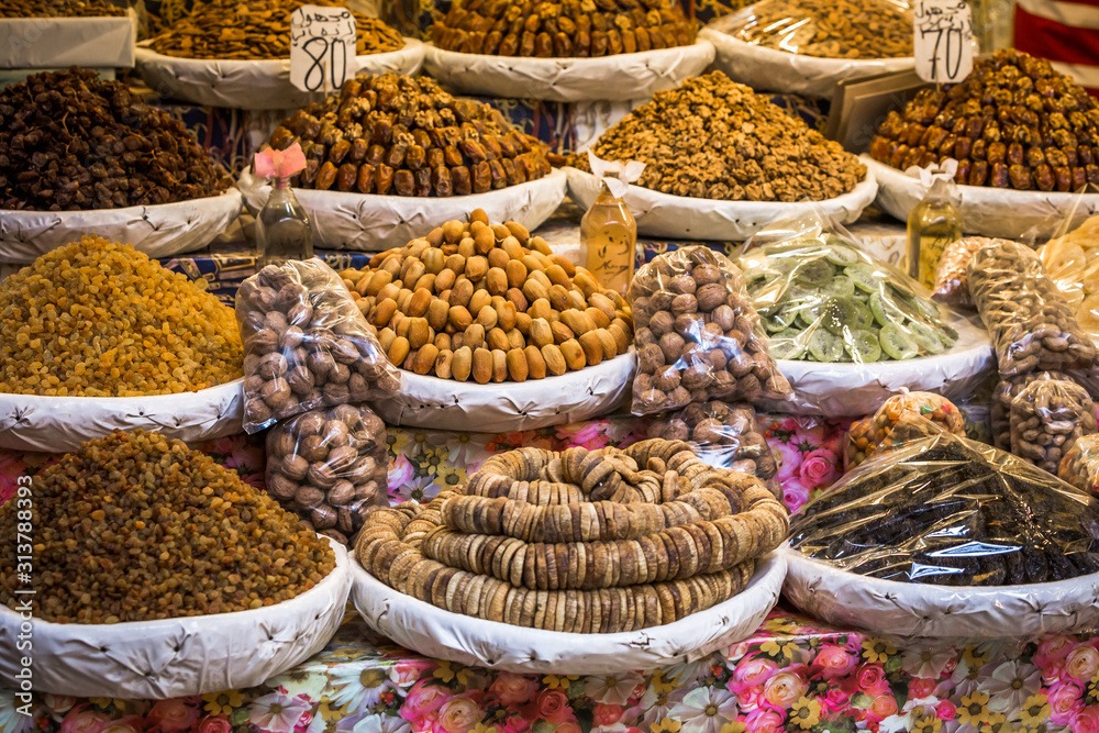 Nutmegs and raisins, dry fruits from a moroccan market shop in the Medina of Fes