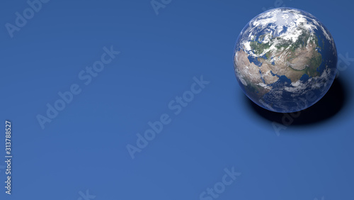Earth miniature on a blue background. Elements of this image by Nasa