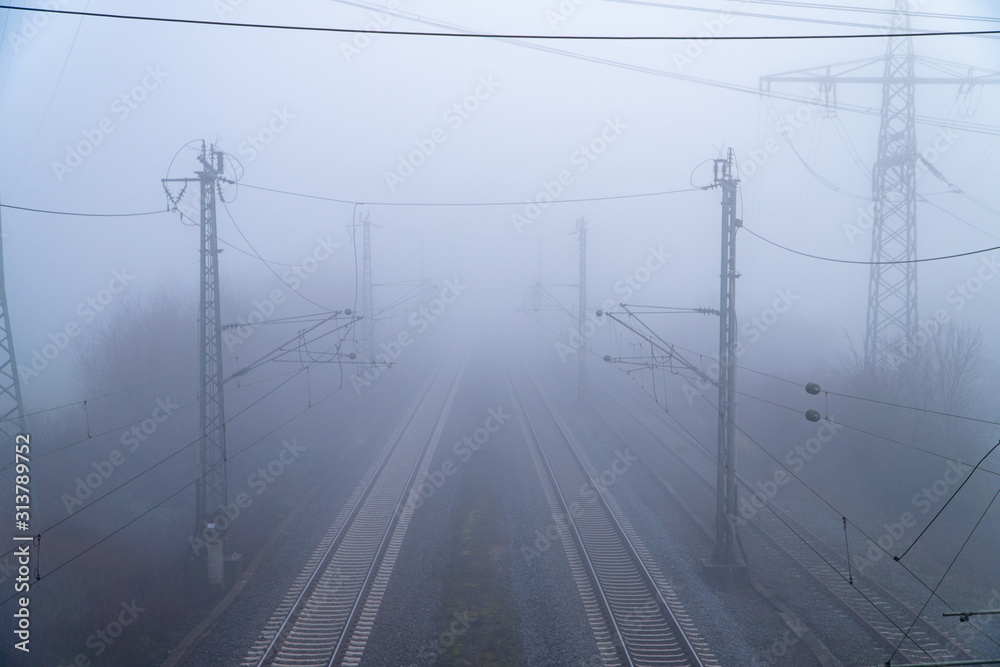 Train tracks in the fog - symmetrical fog image
