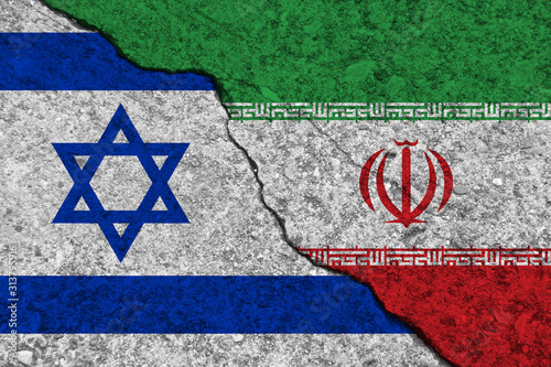 Cracked painted concrete walls between the Israel flag and Iran. Concept of conflict.